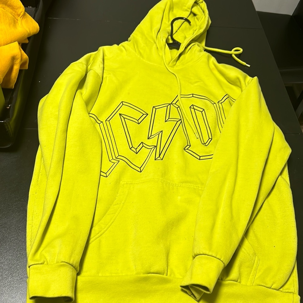 It’s a light green sweater and it’s in perfect condition